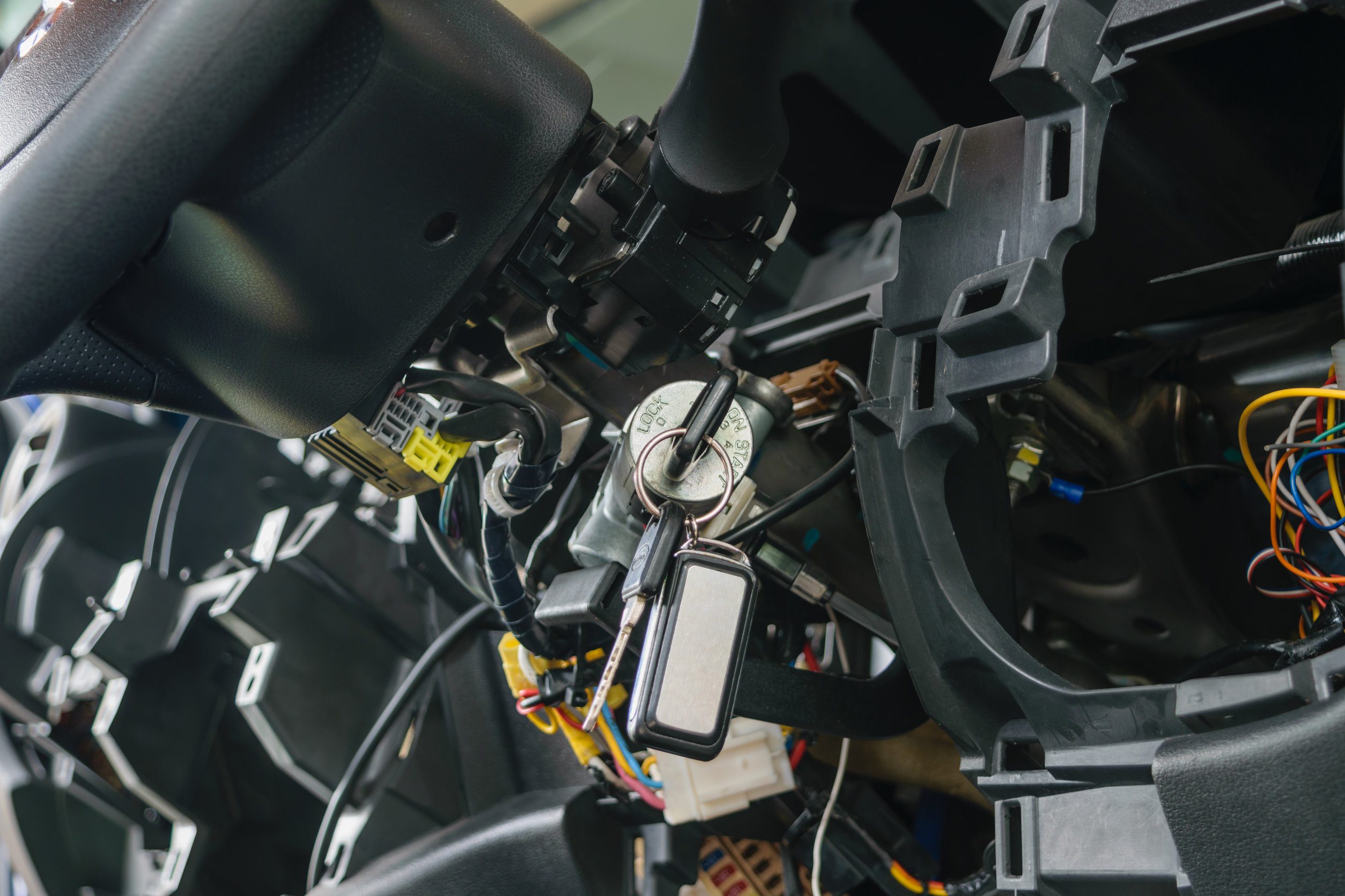 Disassembled console in car for wires checking